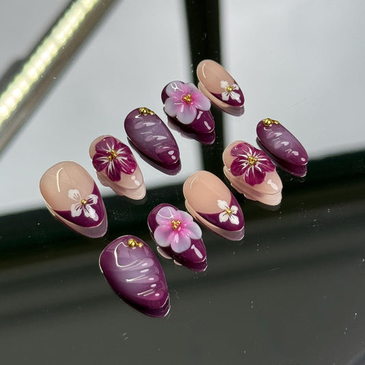 Elegant 3D floral Short Almond press-on nails: deep purple and pink blooms. Perfect for a sophisticated, cute edgy style