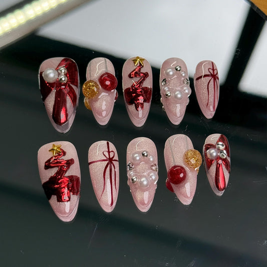 Festive Christmas Almond Shaped Christmas Nail Set Stylish Holiday Elegance with Red and Gold Embellishments, Perfect for a Seasonal Stateme