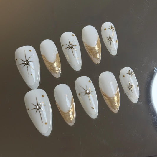 Golden Stunning Press-on Nail Celestial Starry Set with Gild Accent Almond French Tip Intricate design Perfect for Everyday Wear