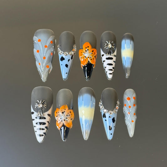 Polka Dot Exotic Style Stiletto Shape Press-on Nail Set with Blue, Grey and Orange Color Blended Design and Chrome Cross Embellishment