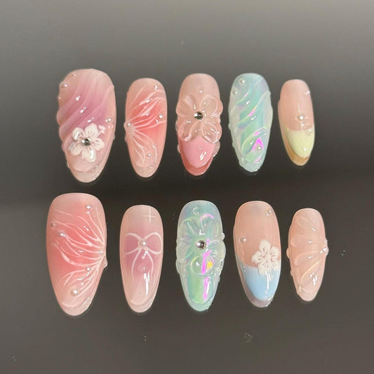 Enchanted Beautiful Handmade Pastel Press-on Nail Set Featuring Butterfly Print, Petals and Soft Pink Bow and Blue Iridescent Hues Spring